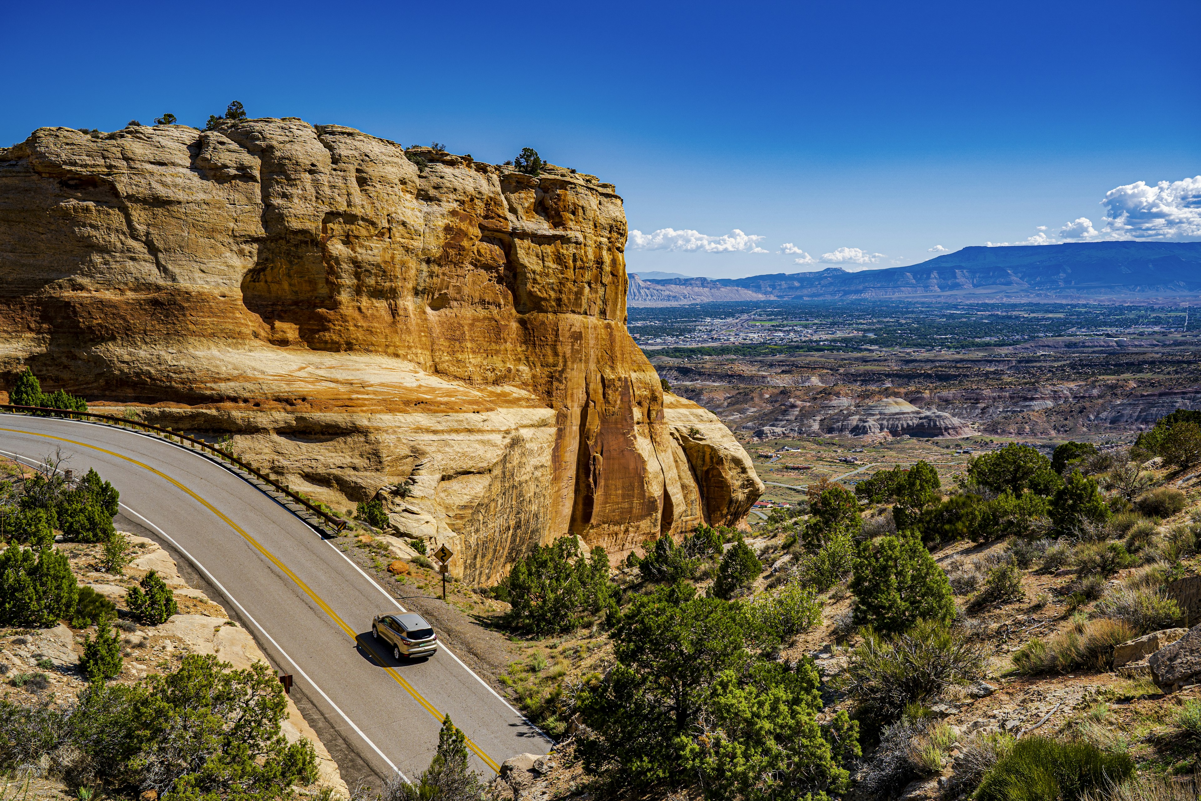 It's a lot easier to explore the dramatic Colorado countryside if you have your own wheels. Thomas Roche/Getty Images