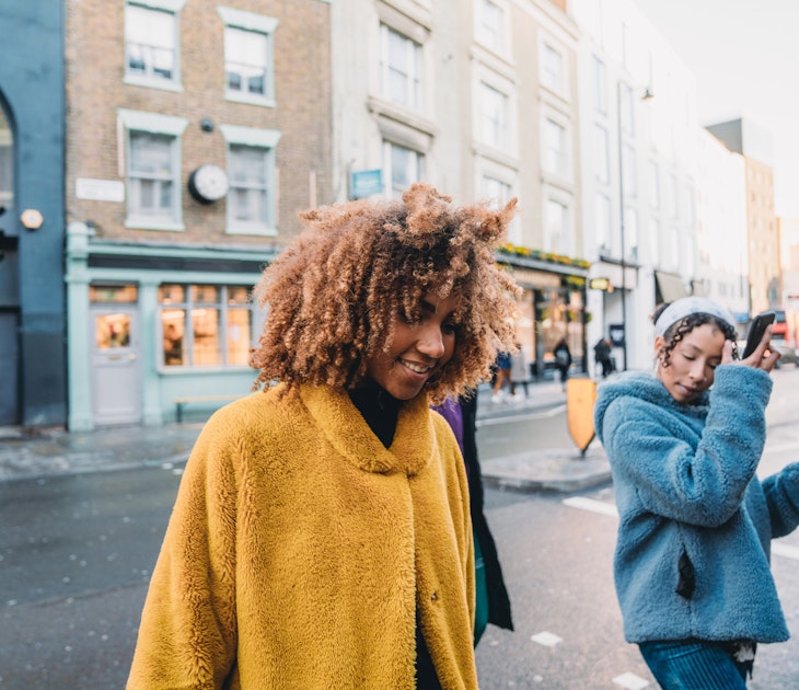 Hip friends walking in the city. They are walking in a London street. Mixed race and african ethnicities.
1355054562