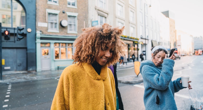 Hip friends walking in the city. They are walking in a London street. Mixed race and african ethnicities.
1355054562