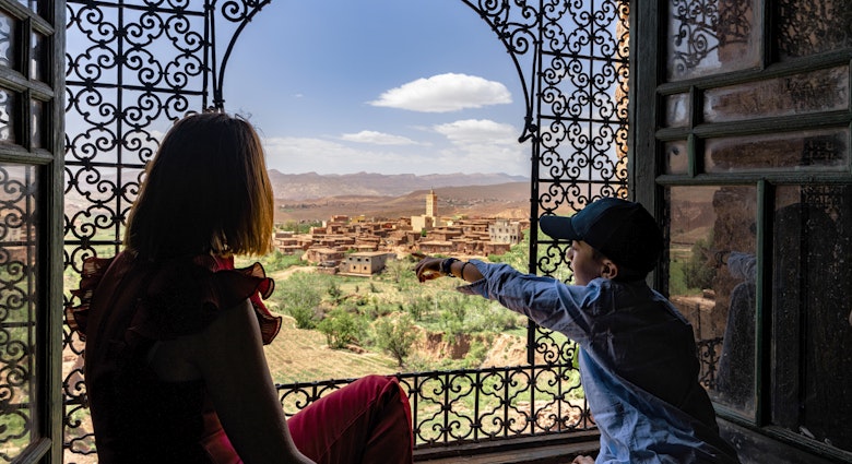 Happy boy with mother admiring the famous Telouet Kasbah sitting inside a traditional arab building, High Atlas mountains, Morocco
1607134967
Morocco