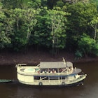 182685434
"Rainforest, Adventure, Amazon Rainforest, Amazon River, Amazonas State, Amazonia, Brazil, Canoe, Carrying, Direction, Discovery, Eco Tourism, Environment, Exploration, Fauna And Flora, Forest, Grass Area, Green, Journey, Lake, Leisure Activity, Mode of Transport, Nature, Nautical Vessel, Passenger, People Traveling, Plant, Plants, Recreational Pursuit, Reflection, Regional Boat, Relaxation, Remote, River, Scenics, Serene People, Tourism, Tourist, Traditional Culture, Tranquil Scene, Transportation, Transportation", Travel, Travel Locations, Tree, Tropical Climate, Tropical Rainforest, Vacations, Water, Woods