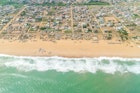 Aerial view of the Atlantic Ocean coastline along the shores of Cotonou, Benin
478055884
Coastline, Aerial View, People, Benin, Africa, Day, Beach, Atlantic Ocean, Sea, Cotonou
Benin