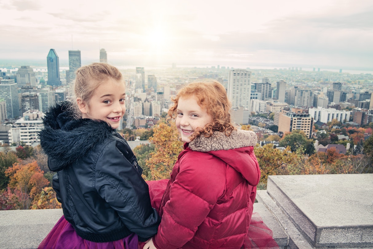 Urban kids: two little girls sitting and hugging in front of cityscape. Horizontal with copy space. One is wearing a black coat with a tight bun, the other a red coat with curly hair. This was taken at one of Montreal city belvedere. Waist up shot, outdoors.
522344151
Warm Clothing, Candid, Tourism, Little Girls, Two People, Copy Space, City Life, Cute, 6-7 Years, Smiling, Sitting, Connection, Togetherness, Friendship, Red, Lifestyles, Childhood, Urban Scene, Outdoors, Waist Up, Looking At Camera, Horizontal, Redhead, People, Montreal, Autumn, Cityscape, City
