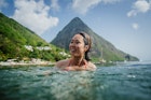 A woman enjoys the waters off Jalousie Beach, between the valley of the Pitons on the West Coast of Val des Pitons, Soufriere, St. Lucia
539976637
null
St Lucia