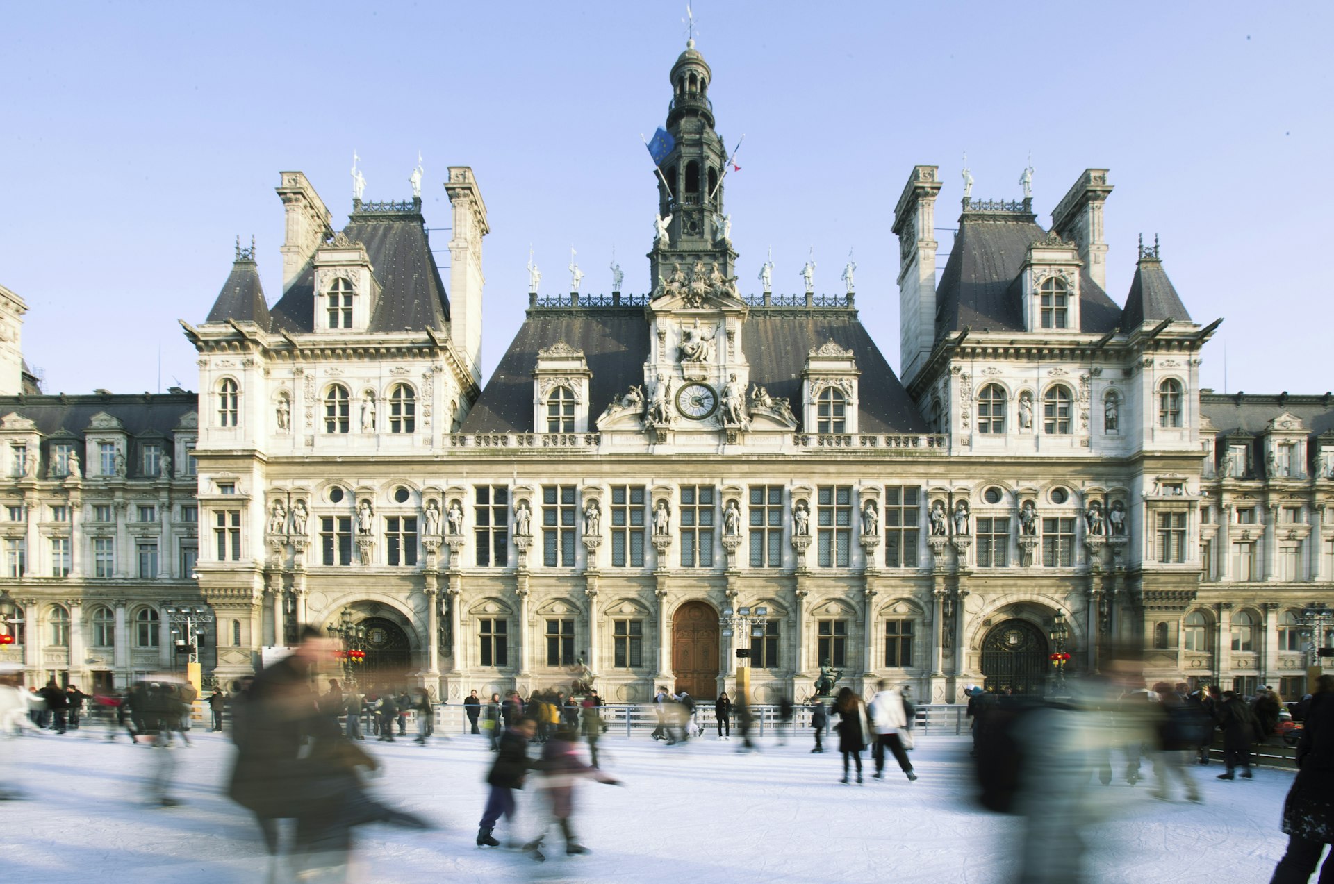 Ice skaters use a rink in front of Hotel de Ville in Paris
