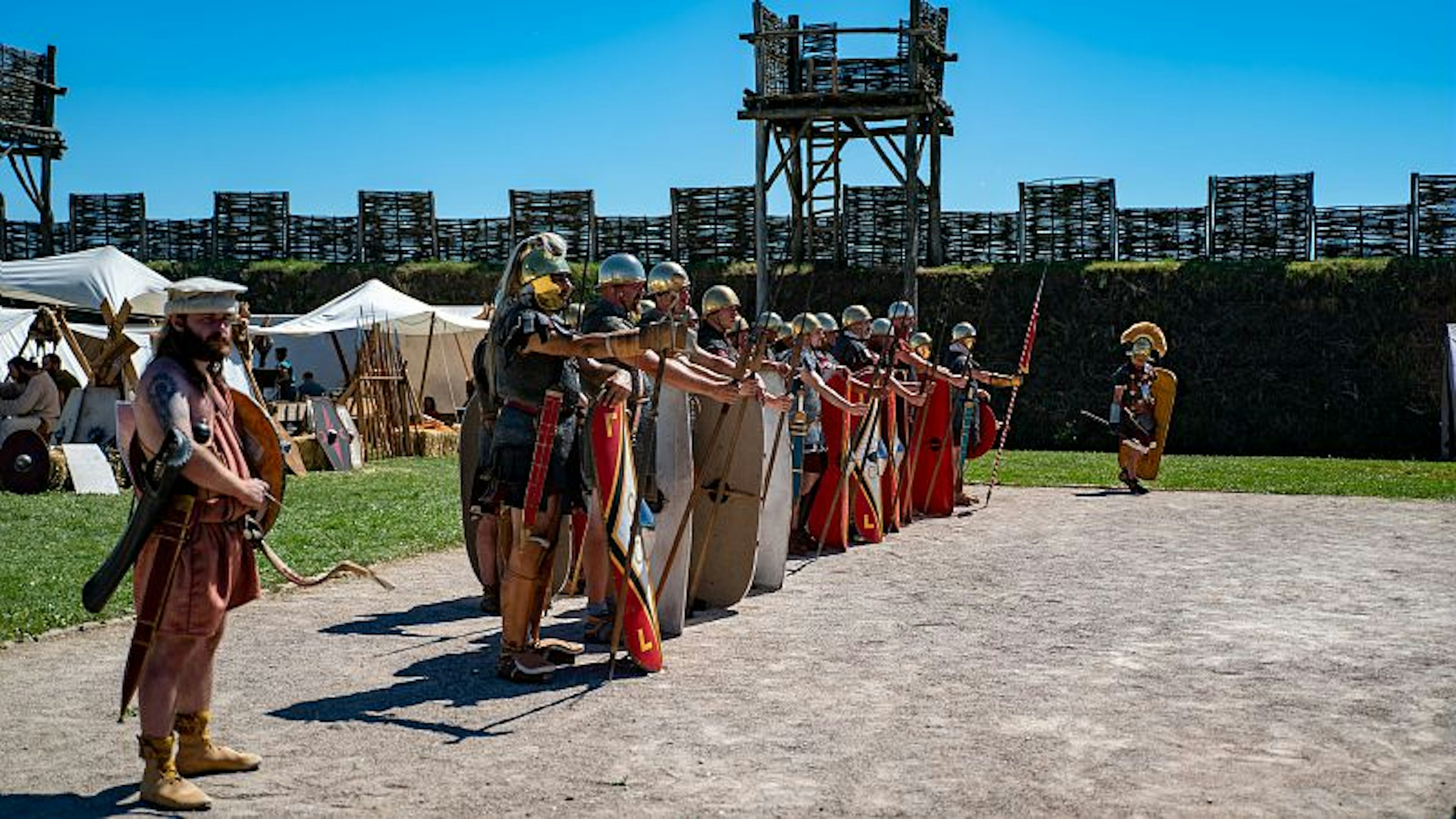 Workers at MuséoParc Alésia dressed as Gaulish soldiers for a reenactment