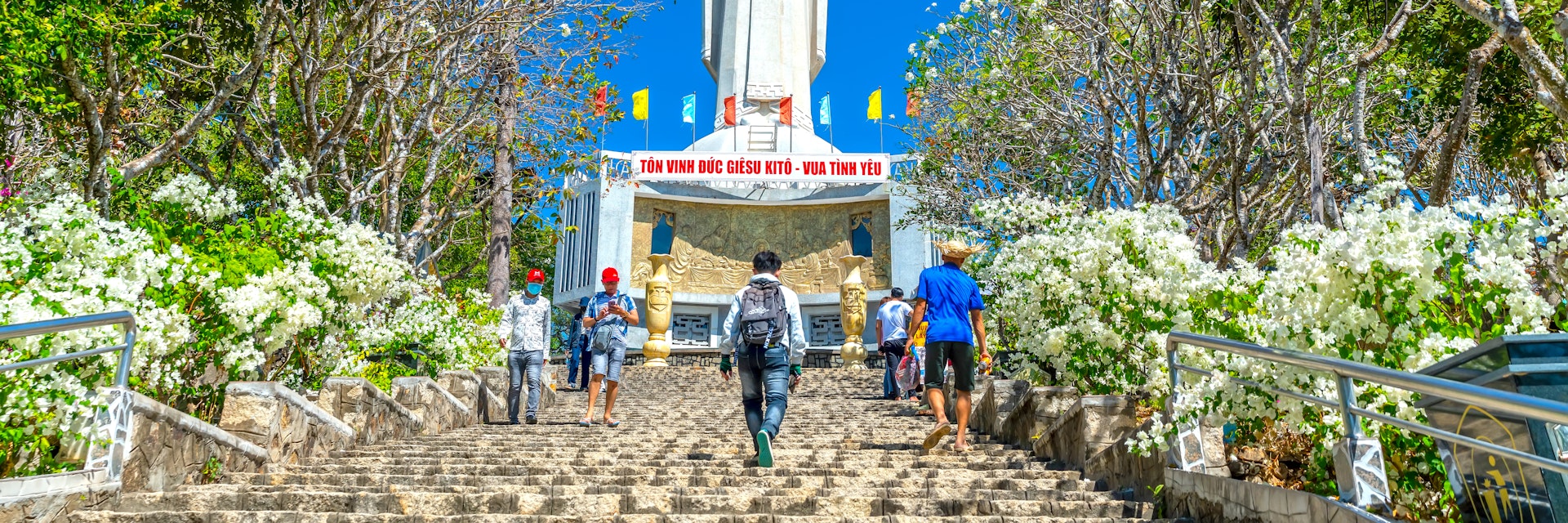 Statue of Jesus Christ standing on Mount Nho attracts pilgrims to visit.