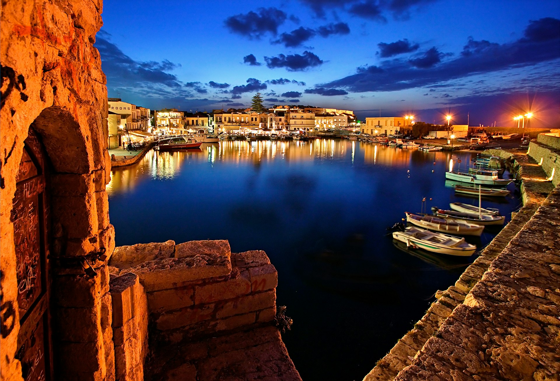 The picturesque old harbor of Rethymno town by night, Crete, Greece