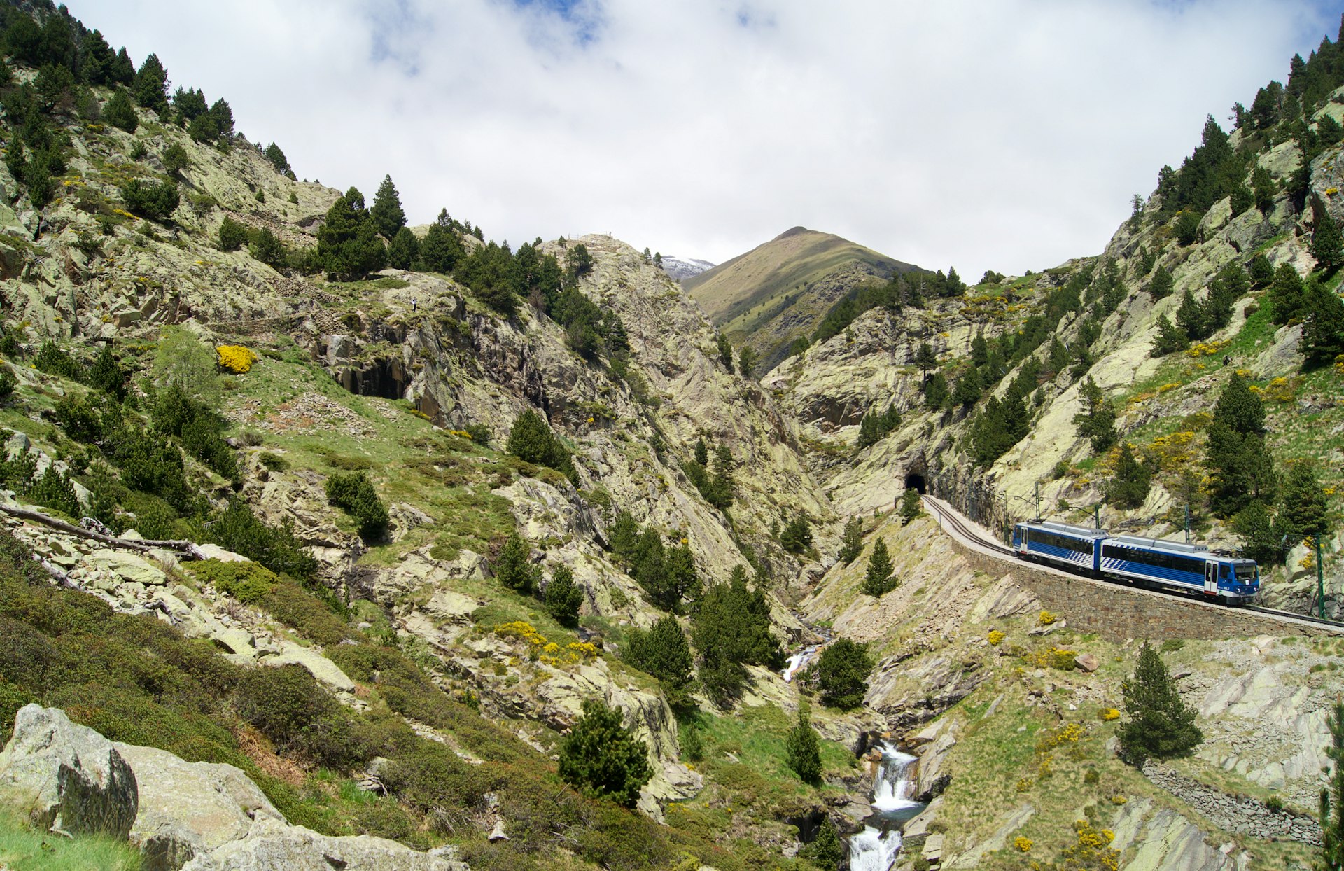 A train passes the Vall de Nuria Hiking Trail, Catalonia, Spain