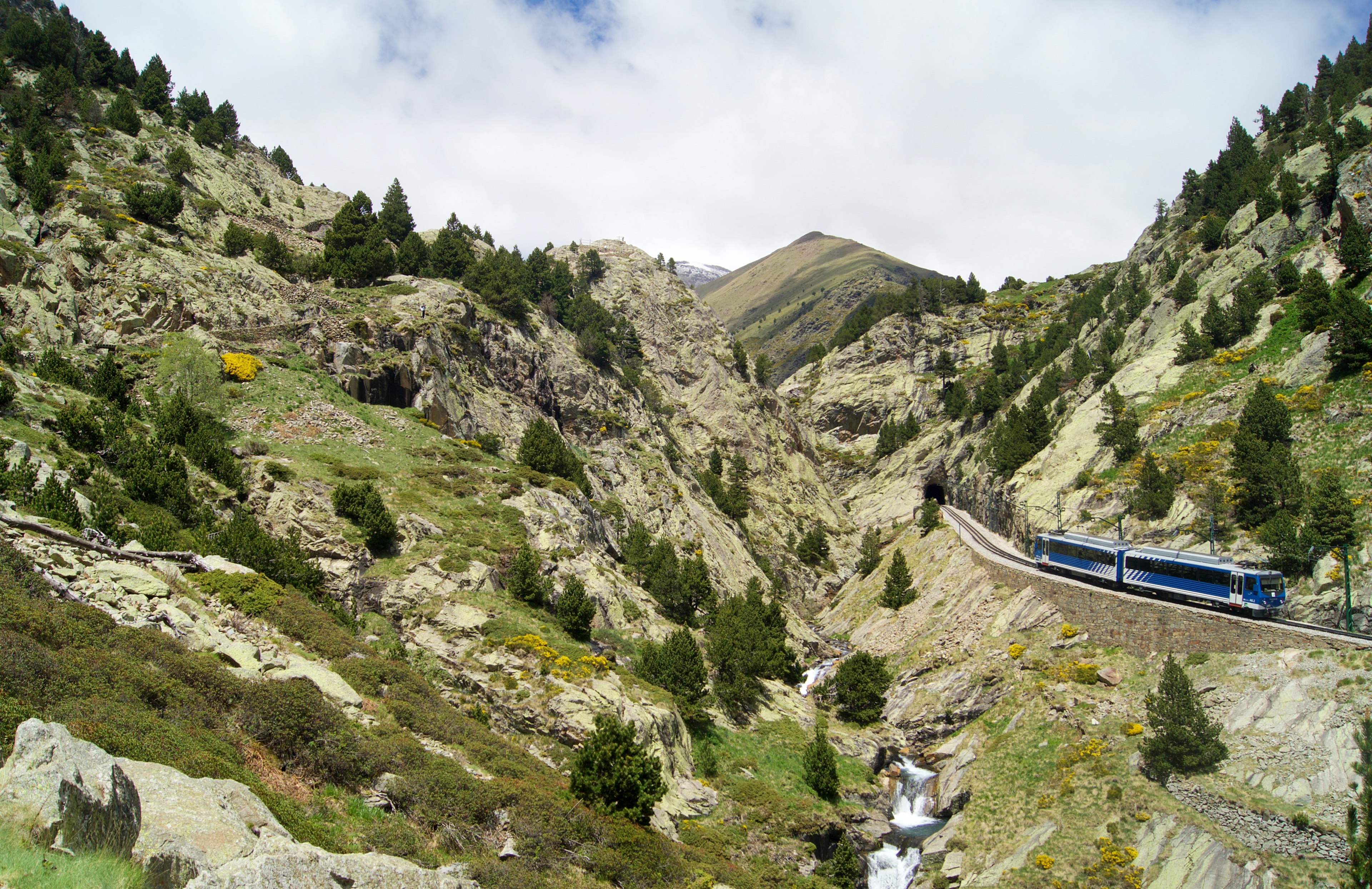 A train passes the Vall de Nuria Hiking Trail, Catalonia, Spain