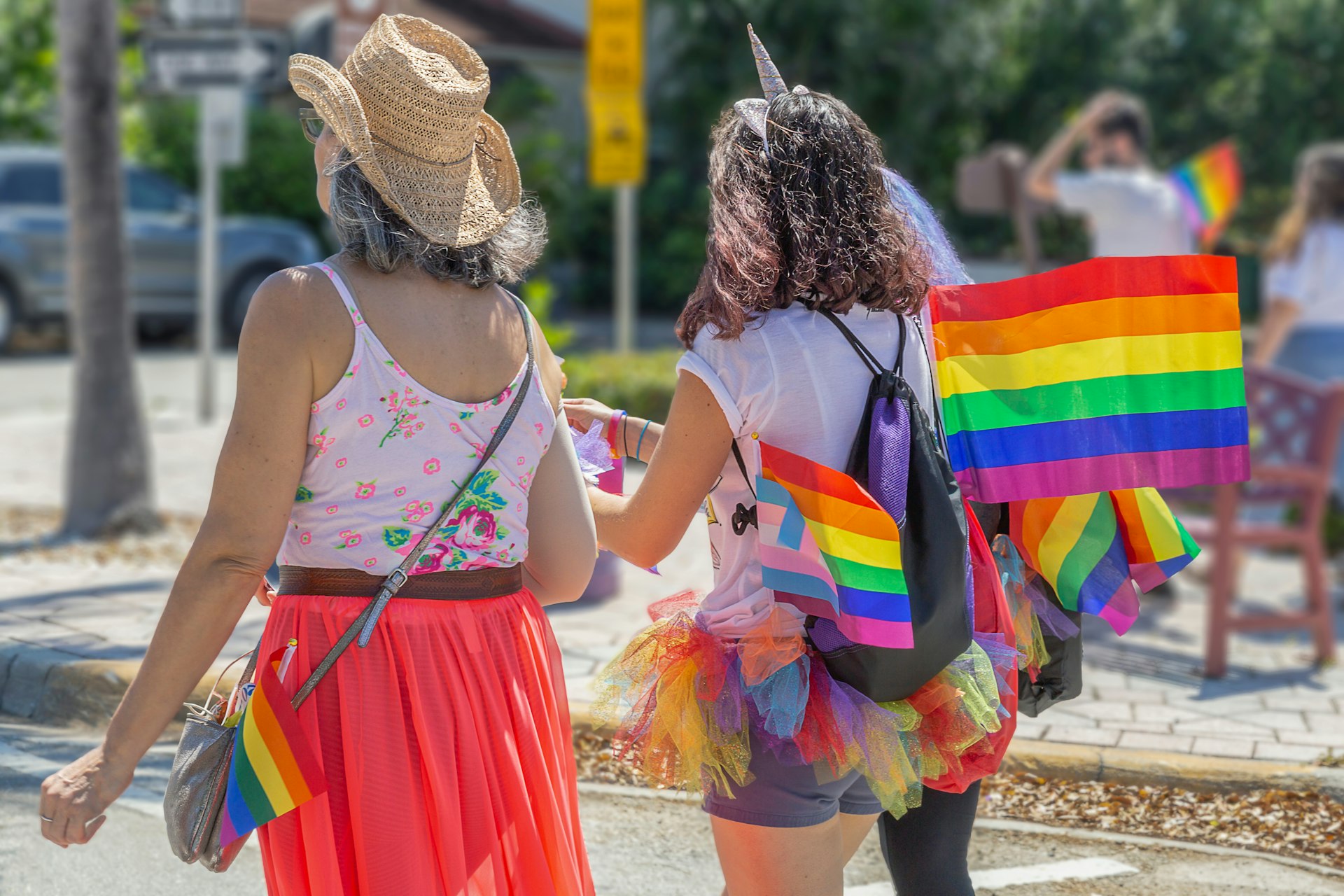 Women walking at an LGBTIQ+ pride march in Florida