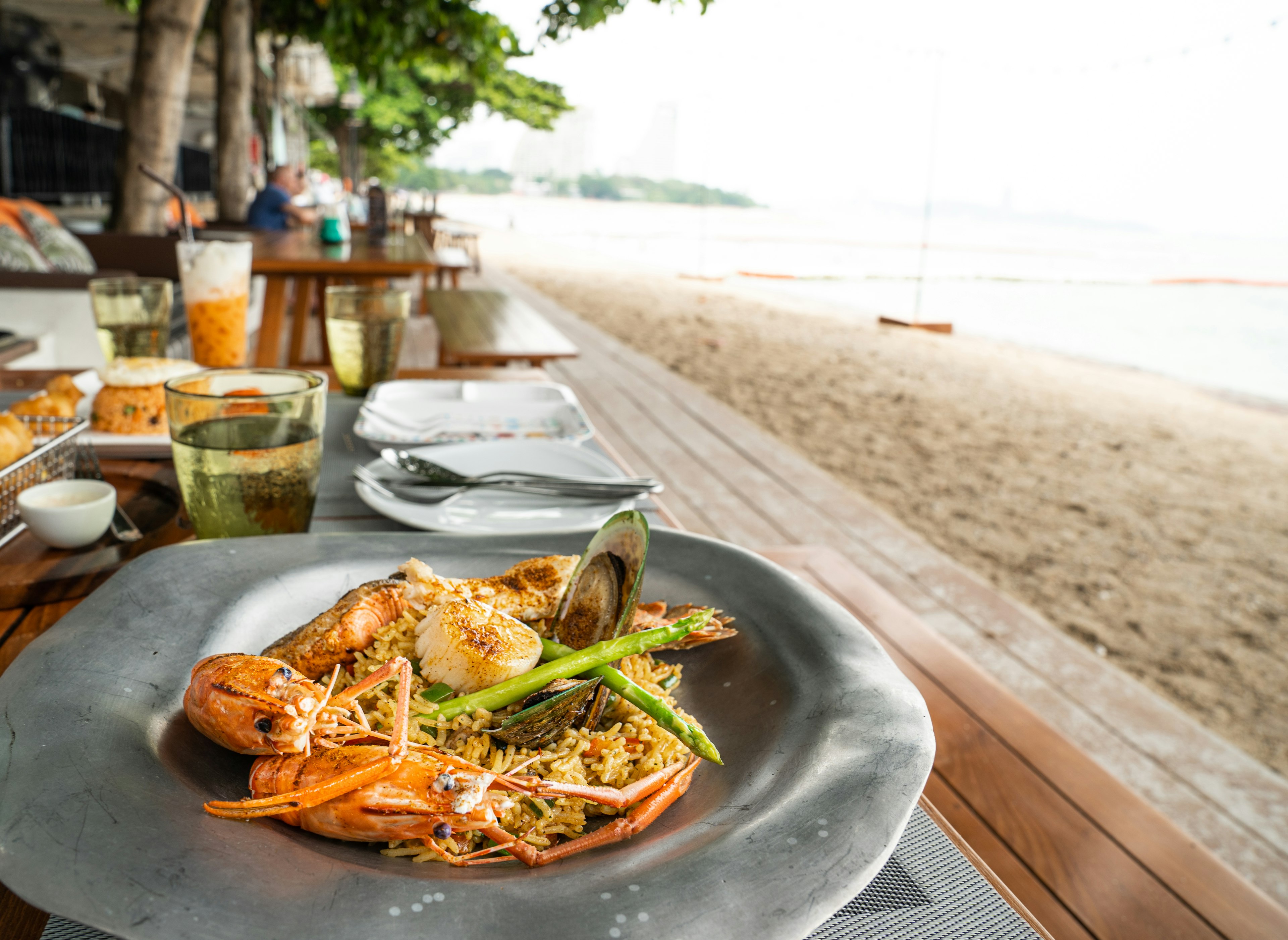 A plate of paella served beside the beach on Formentera, Ibiza