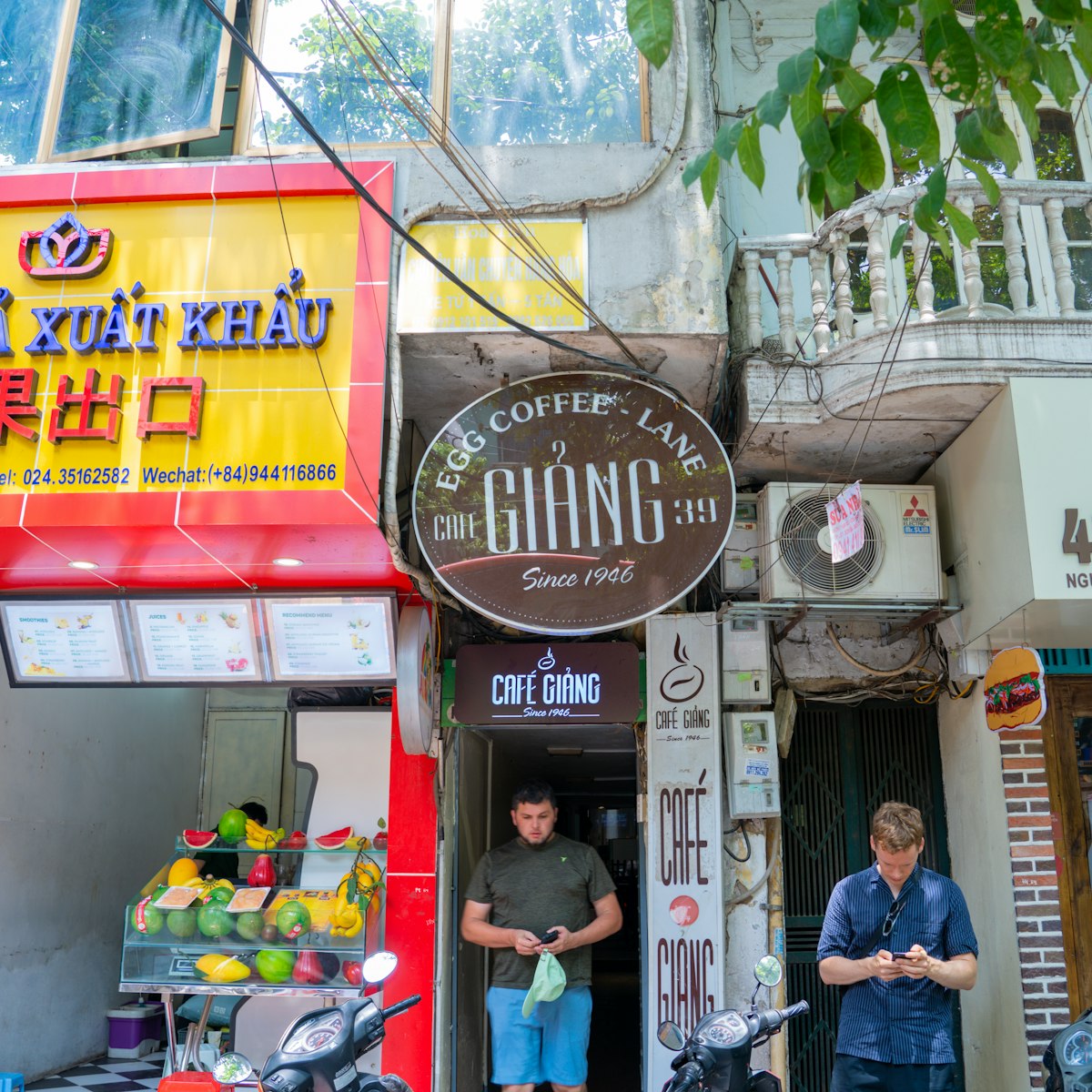 Restaurant name tag Egg Coffee Cafe Trung Local Coffee shop dessert CAFE GIANG in OLD QUARTER CITY.

