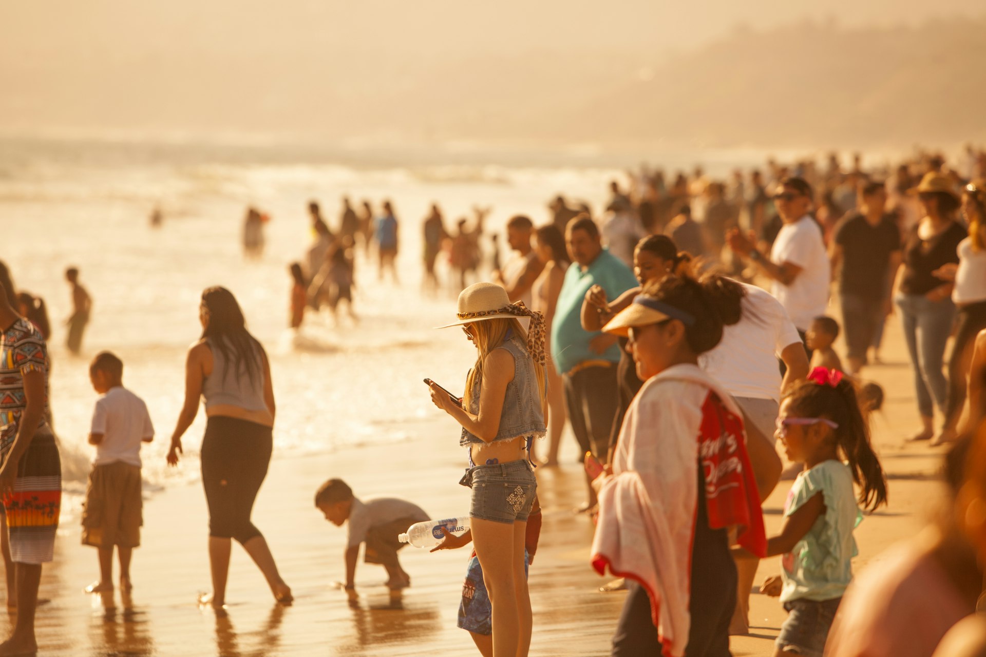 Crowds gathered to sunbathe and swim at the Santa Monica State Beach 