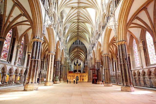 The nave of Lincoln Cathedral. Lincoln Cathedral is the seat of the Bishop of Lincoln with its building beginning in 1088 and continuing throughout the medieval period.