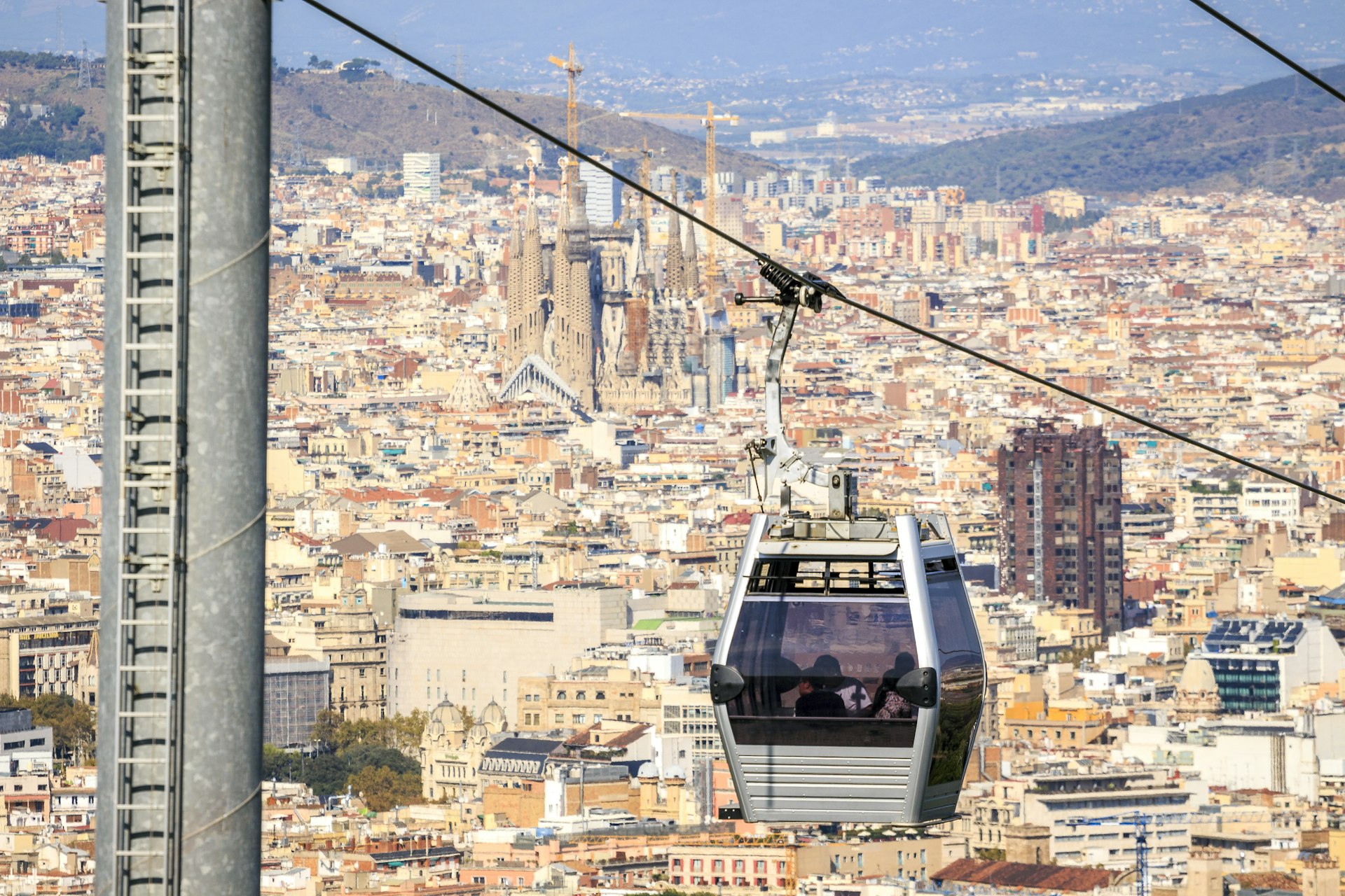 Montjuic cable car with Barcelona skyline in background