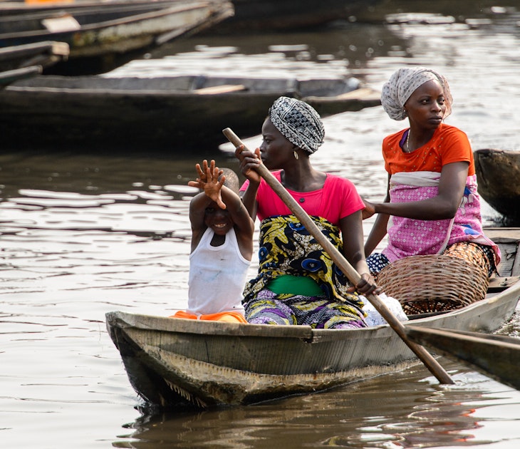 GANVIE, BENIN - JAN 11, 2017: Unidentified Beninese family in a wooden boat at the port of the lake Nokwe. Benin people suffer of poverty due to the bad economy.; Shutterstock ID 593573411; full: 65050; gl: Online Editorial; netsuite: Best places to visit in Benin; your: Jennifer Carey
593573411
A Beninese family in a wooden boat sailing across Lake Nokoue in Benin.