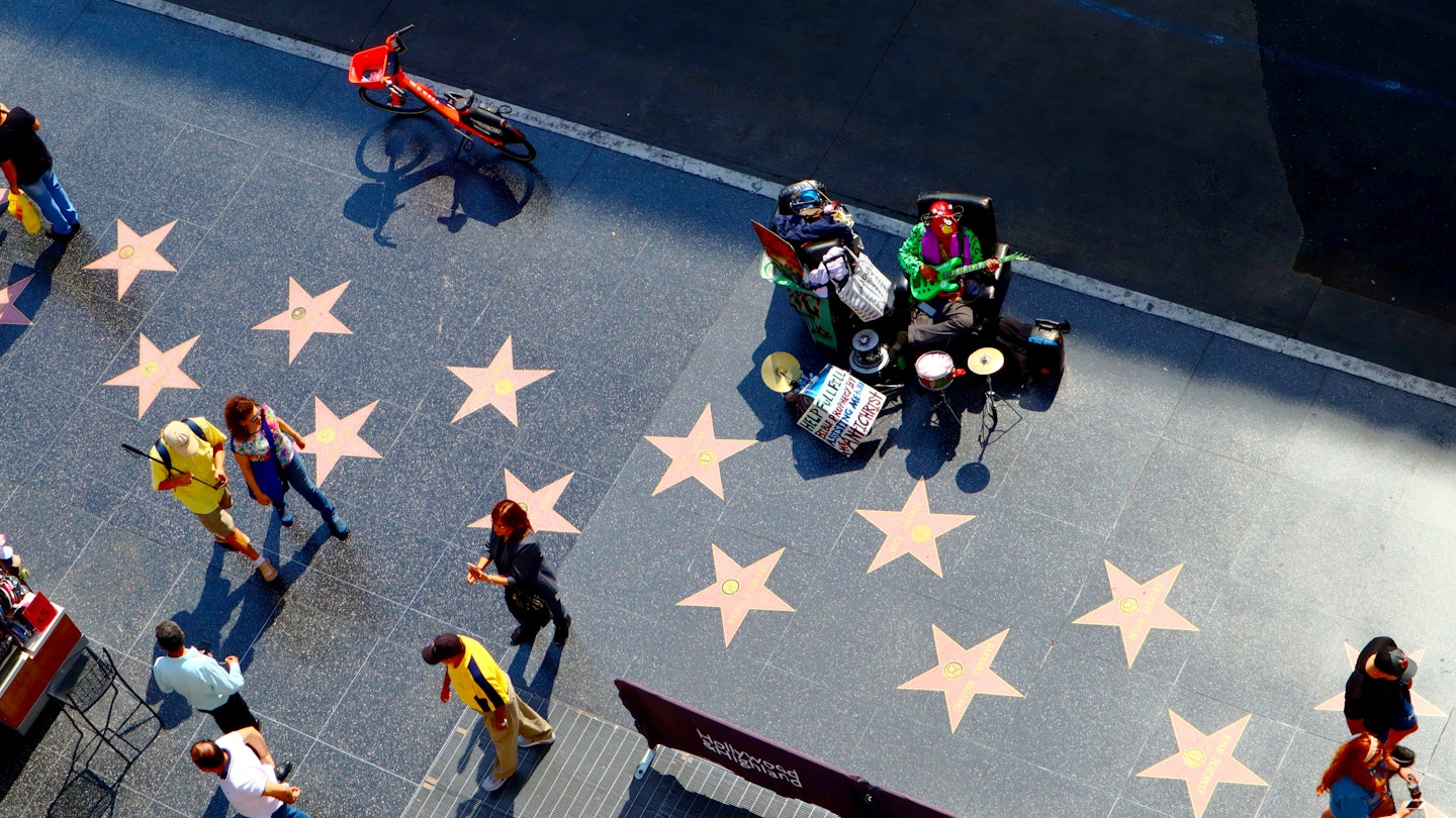 October 10, 2019: High-angle view of the Hollywood Boulevard walk of fame, as seen from the Hollywood & Highland entertainment center Dolby Theatre rooftop terrace.
1559045450
actor, actress, america, avenue, blvd, boulevard, building, california, cars, celebrity, cinema, city, county, dolby theatre, downtown, entertainment, fame, famous, film, glamour, highland, hollywood, landmark, los angeles, media, movie, music, oscar, outside, pedestrians, place, producer, shops, singer, star, starline, street, strip, sunset, theater, theatre, tile, tourism, tourist, traffic, urban, usa, view, walk, walk of fame