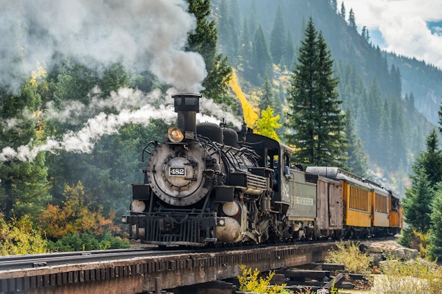 To cross Colorado in style, ride one of the state's vintage trains, such as the Durango & Silverton Narrow Gauge Railroad. Shutterstock