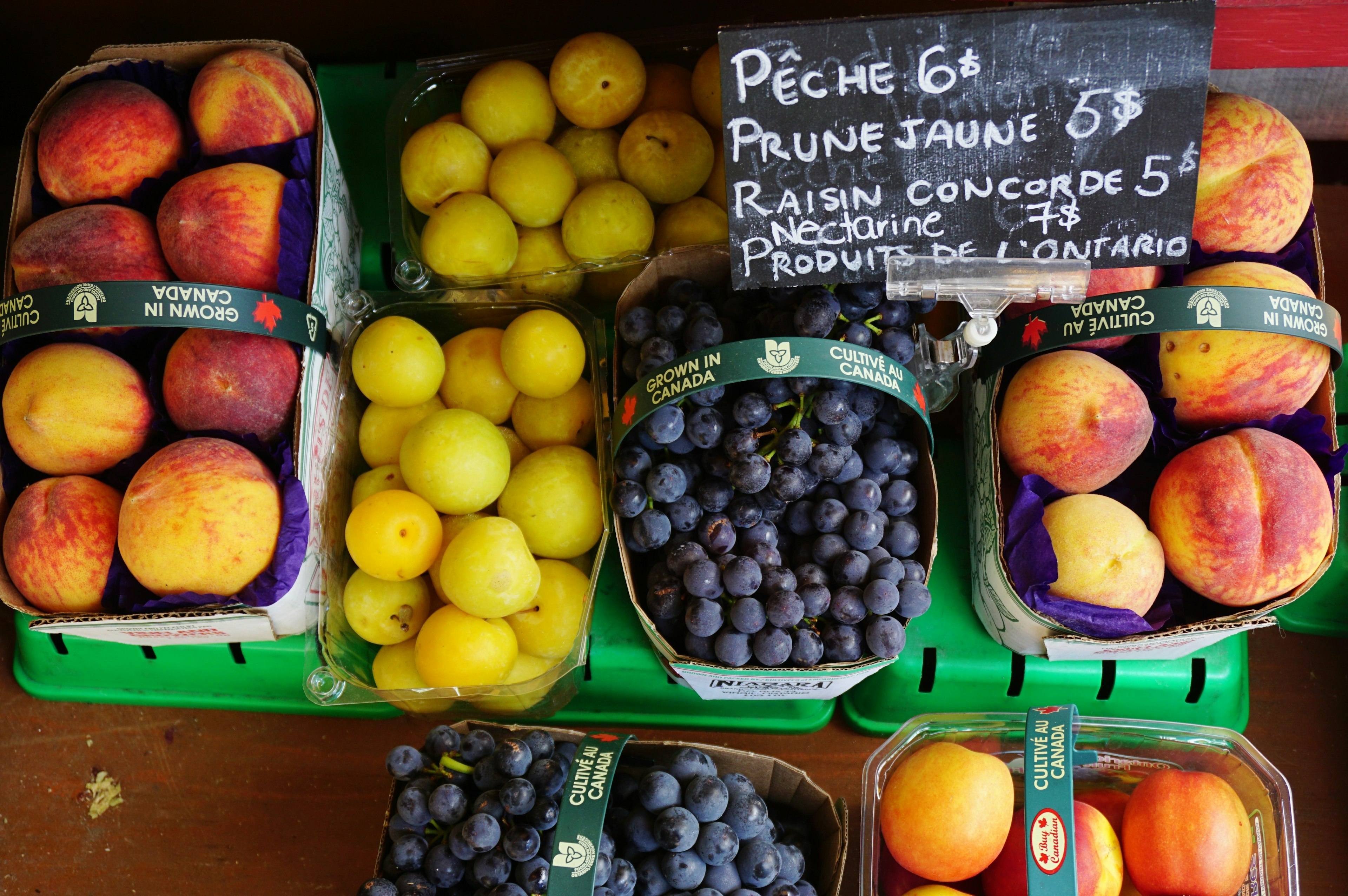 A shot of some fruit for sale at the 1932 Marche Atwater covered public farmers market, located in the Little Burgundy neighborhood of Montreal, sells mostly produce from Quebec and Canada.