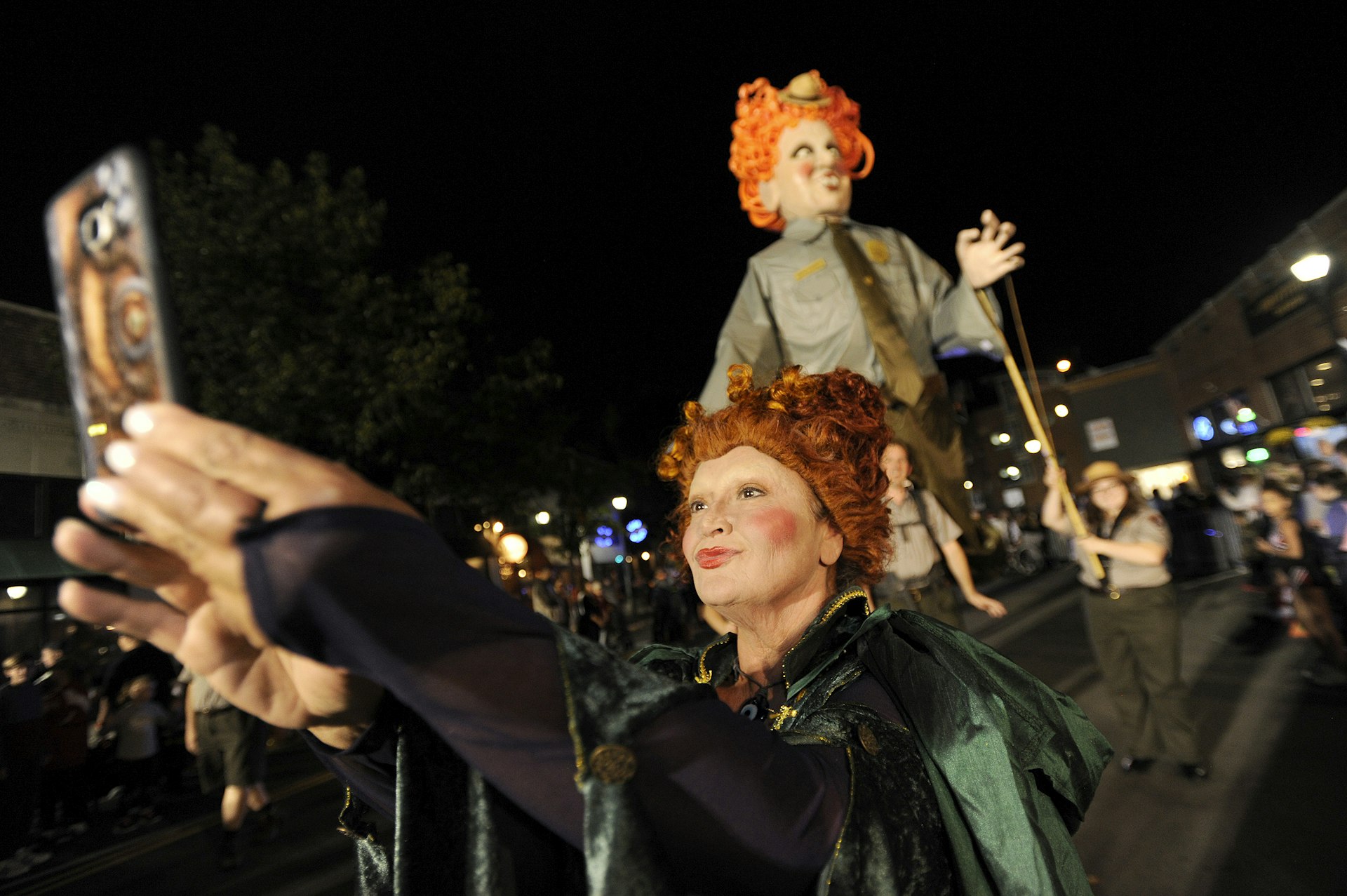 Revelers during the Haunted Happenings Grand Parade, Salem, Massachusetts, USA