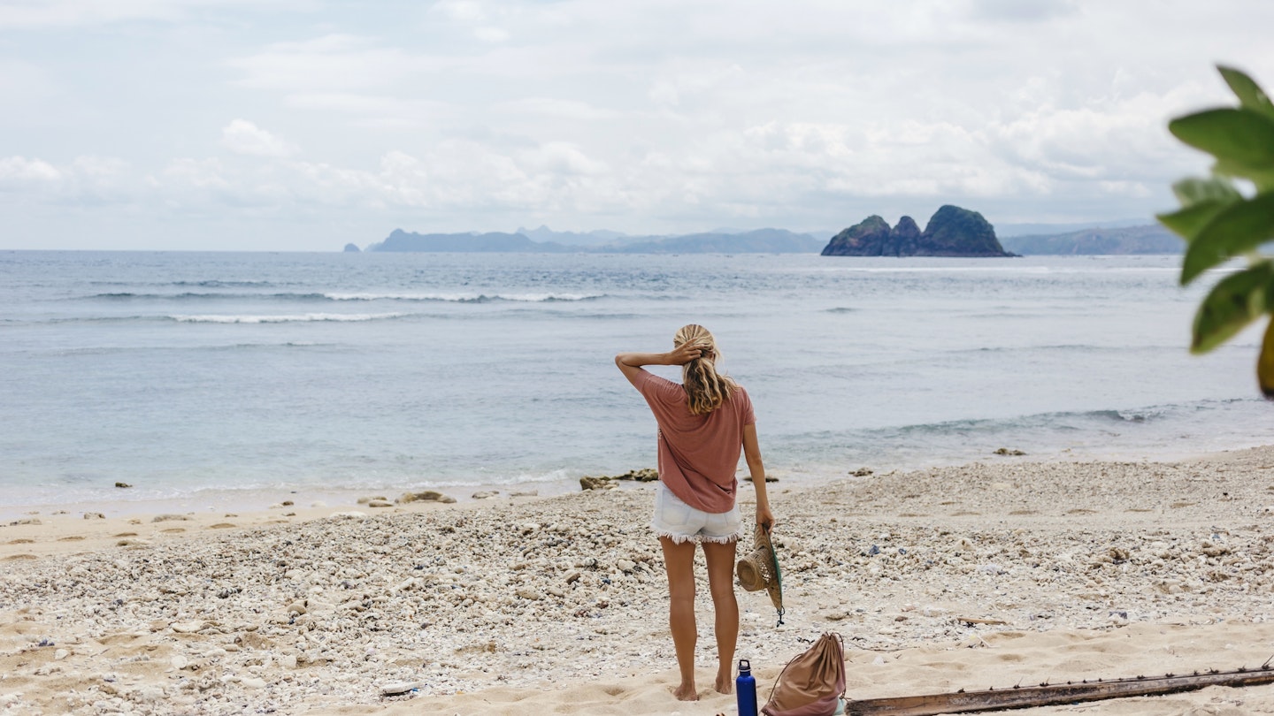 Rear view shot of single woman standing on beach, Kuta, Lombok, Indonesia
1094629404
active, building, casual, coast, holiday, leisure, rock, traveller, tropical, woman, young