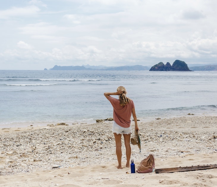 Rear view shot of single woman standing on beach, Kuta, Lombok, Indonesia
1094629404
active, building, casual, coast, holiday, leisure, rock, traveller, tropical, woman, young