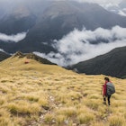 Hiking To The Alpine Hut - stock photo