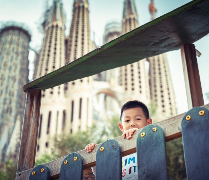 A Chinese boy playing in the children play facilities in front of the Sagrada Fimiliar..The BasÃ­lica de la Sagrada FamÃ­lia also known as the Sagrada FamÃ­lia, is a large unfinished Roman Catholic minor basilica in Barcelona, Catalonia. Designed by Catalan architect Antoni GaudÃ­ (1852â€“1926), his work on the building is part of a UNESCO World Heritage Site...Photo taken on 05/10/2019
A Chinese boy playing in the children play facilities in front of the Sagrada Fimiliar..The Basílica de la Sagrada Família also known as the Sagrada Família, is a large unfinished Roman Catholic minor basilica in Barcelona, Catalonia. Designed by Catalan architect Antoni Gaudí (1852–1926), his work on the building is part of a UNESCO World Heritage Site...Photo taken on 05/10/2019
1192653736