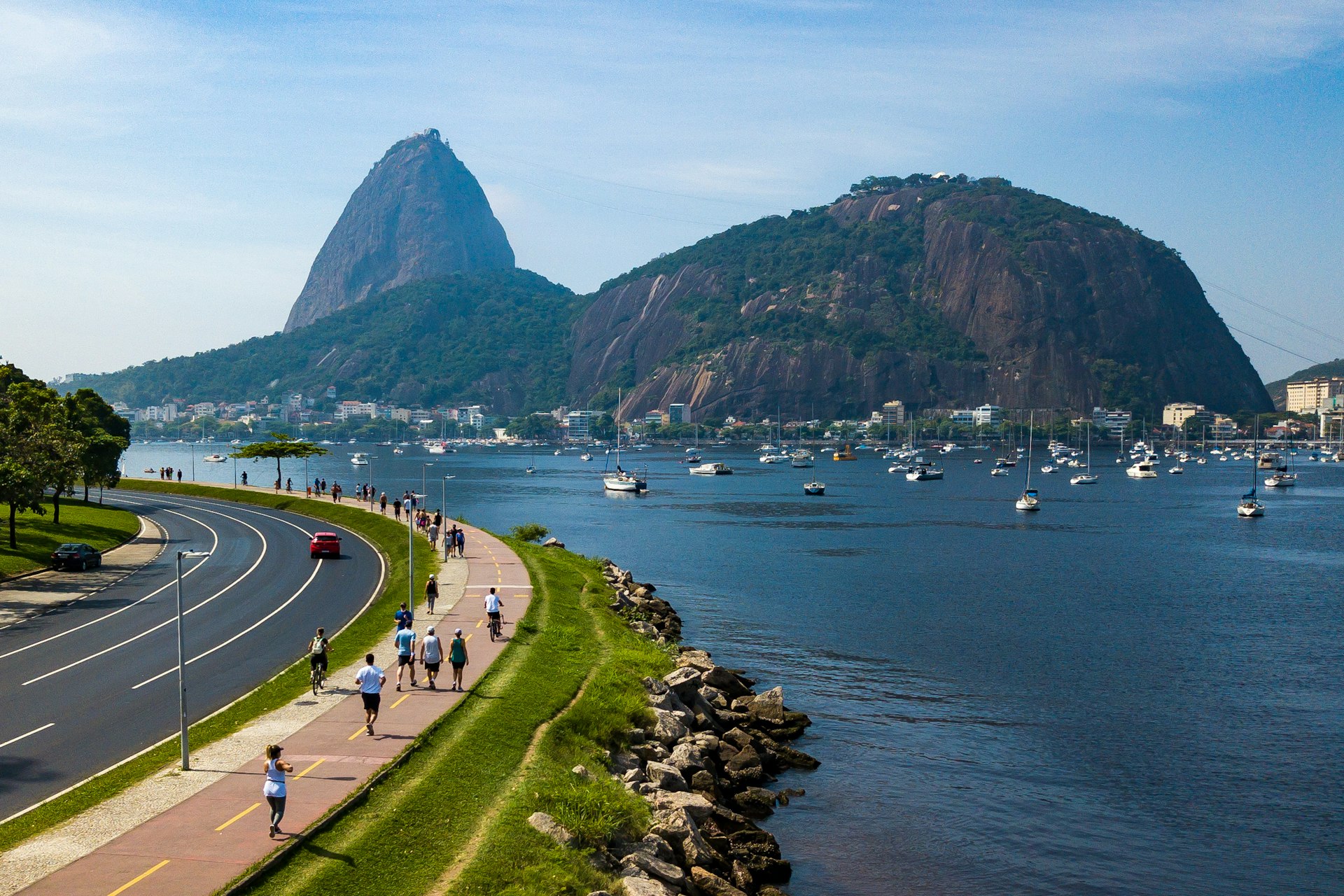 people enjoying the weather at Botafogo Beach by Guanabara Bay, Rio de Janeiro, Brazil