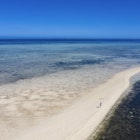 Aerial of woman alone on sandbank during boat excursion from Six Senses Fiji Resort, Malolo Island, Mamanuca Group, Fiji
1305803747