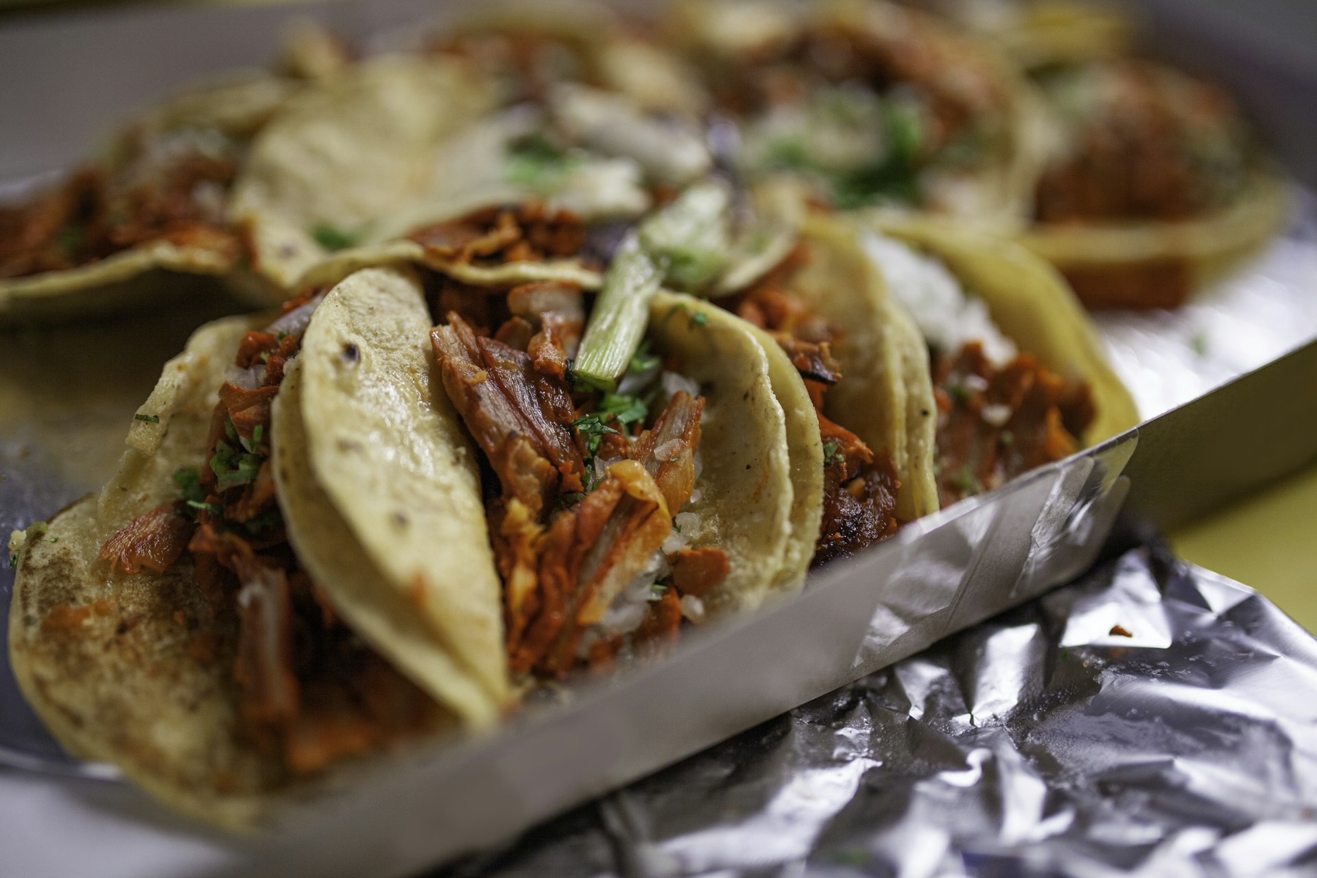 A close-up image of tacos al pastor