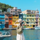 woman traveler visiting in Taiwan, Tourist with backpack and hat sightseeing in Keelung, Colorful Zhengbin Fishing Port, landmark and popular attractions near Taipei city . Asia Travel concept
1480972323
heping