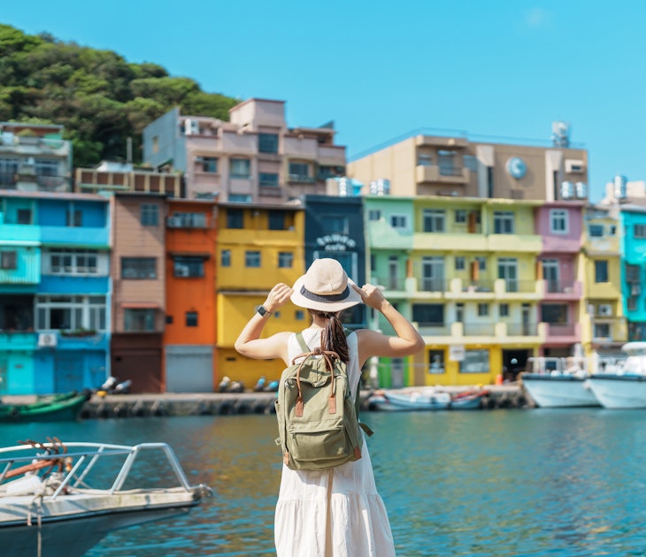 woman traveler visiting in Taiwan, Tourist with backpack and hat sightseeing in Keelung, Colorful Zhengbin Fishing Port, landmark and popular attractions near Taipei city . Asia Travel concept
1480972323
heping