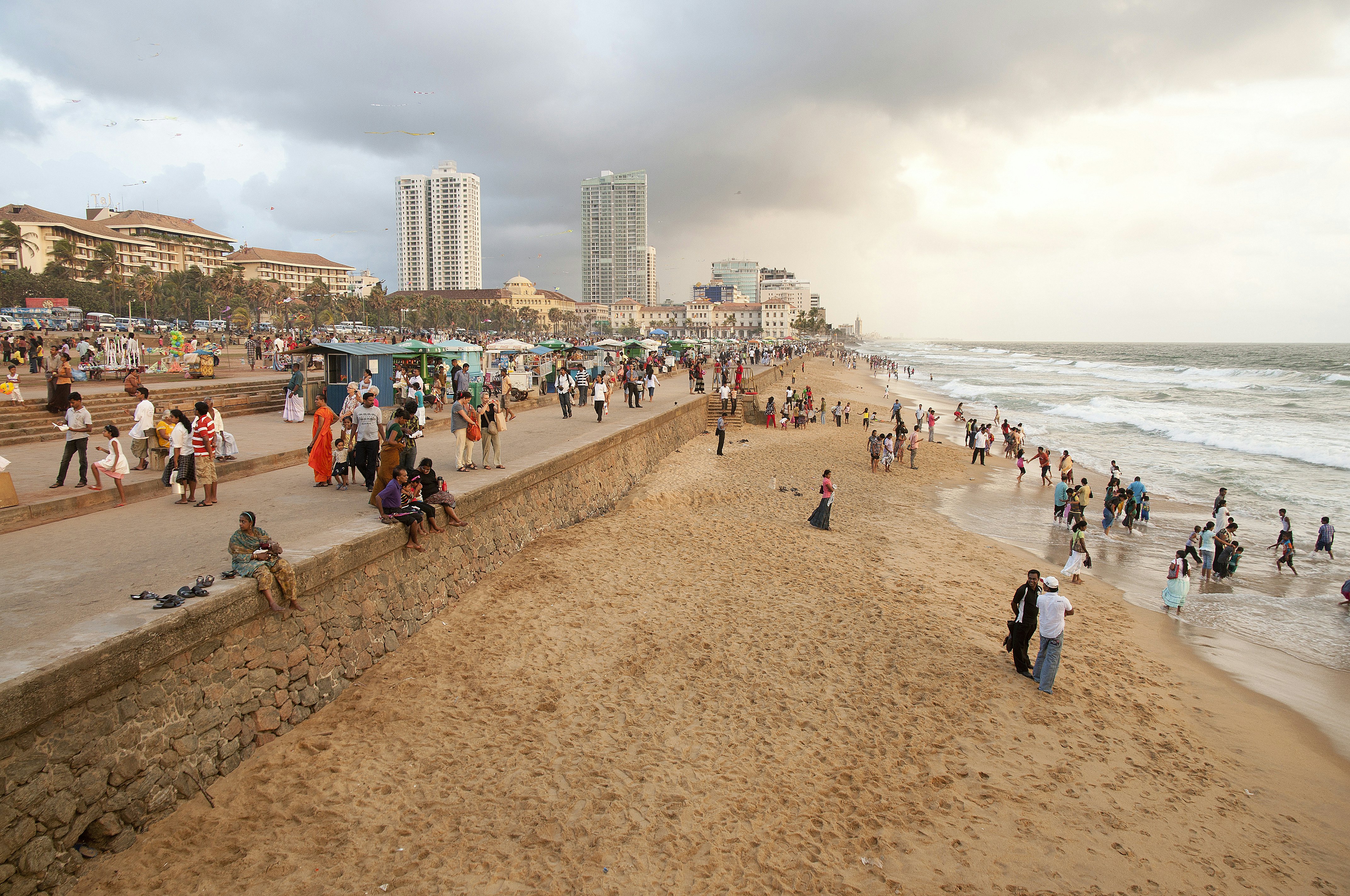 Crowd cool off at city beach by Galle Face Green, Kollupitiya Colombo.
