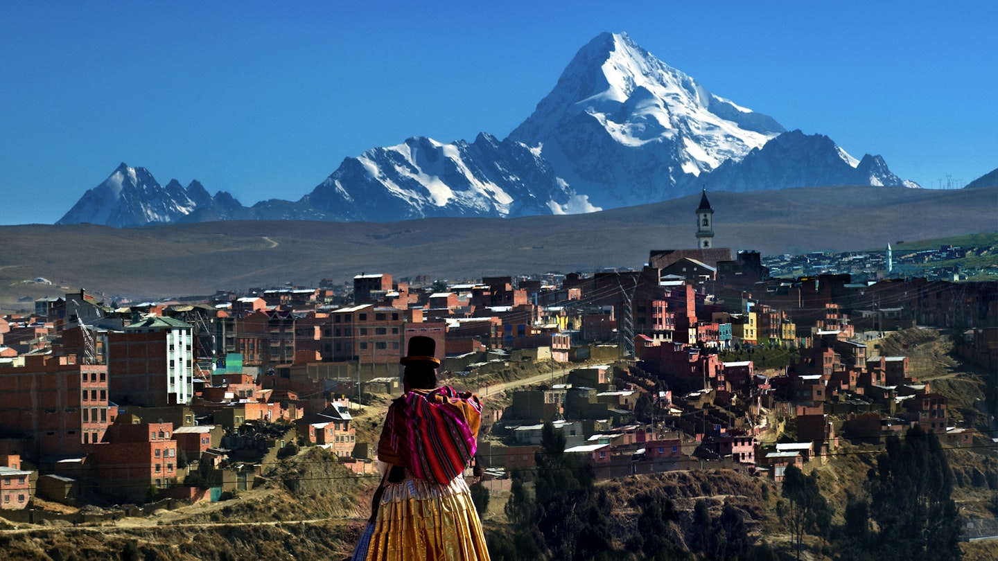 Snowcapped Mount Huayna Potosi rises above the growing indigenous Aymaran city of El Alto, Bolivia.  El Alto is one of the highest major cities in the world, up to 13,615 above sea level, and sits just above La Paz on the Altiplano highlands.   Most of the population consists of indigenous Aymarans who have migrated from the countryside.
159142348
Traditional Culture, Aymaran, Mountain, Architecture, El Alto