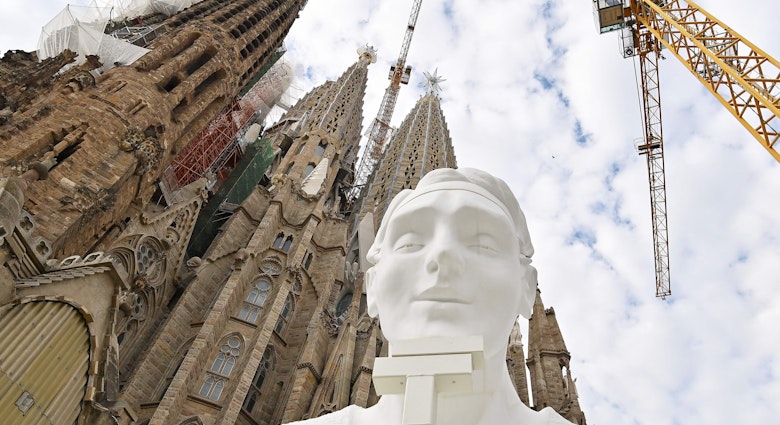 This picture taken on September 19, 2023 shows a pinnacle depicting a human figure that will be set at 135 meters high at the Evangelist Matthew's tower, during a press conference to announce the new steps in the construction of the Expiatory Church of the Sagrada Familia basilica in Barcelona. Jordi Fauli is the seventh architect director of Spanish architect Antoni Gaudi's master piece the Sagrada Familia (Holy Family) basilica, an infinite work that has been built for almost 140 years in the heart of Barcelona. (Photo by Pau BARRENA / AFP) (Photo by PAU BARRENA/AFP via Getty Images)
1676939087
religion, architecture, Horizontal, topix, bestof
