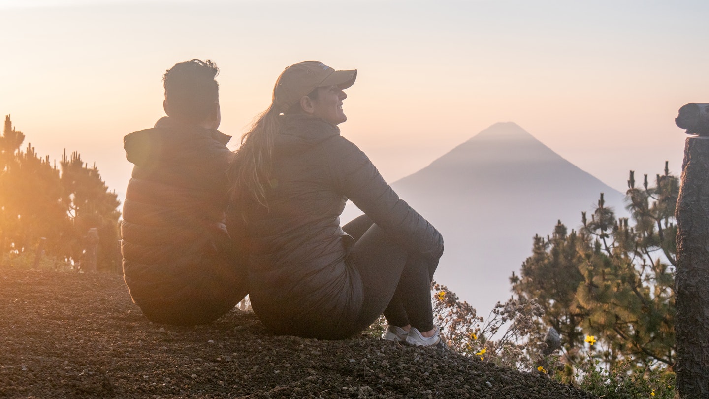 They enjoy nature at sunrise, looking at the beautiful landscape. Volcan Acatenango, Guatemala
1693334693