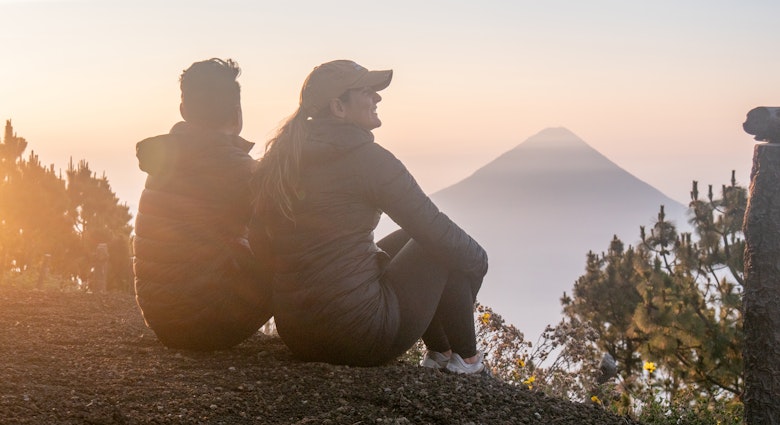 They enjoy nature at sunrise, looking at the beautiful landscape. Volcan Acatenango, Guatemala
1693334693