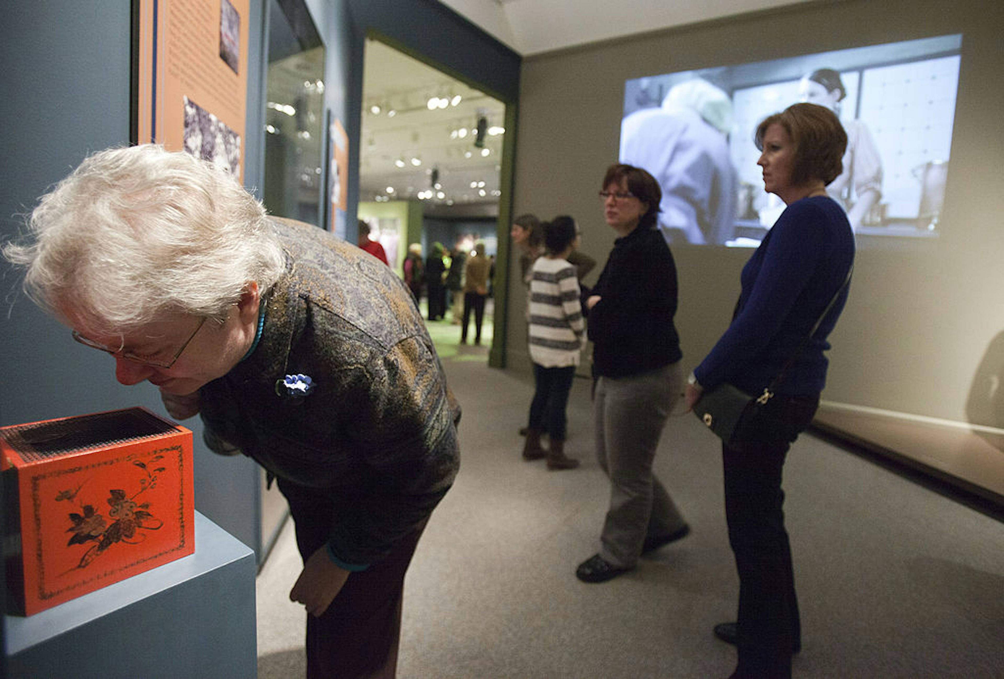 Visitors view an original exhibition,