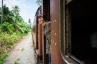 A Chinese tourist was traveling in Sri-lanka by train.  Train travel in Sri Lanka can be an adventurous and funny experience.
537496026