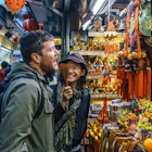A woman and man shopping together in a Taipei market