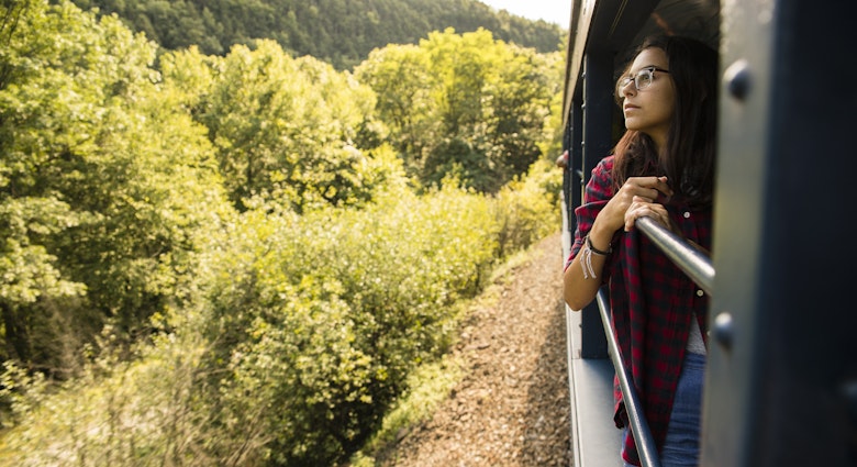 The attractive 15-years-old teenager girl enjoy the train ride through the scenic landscapes. Pennsylvania, Poconos region, USA.
854623414
700058554, creativecontentbrief