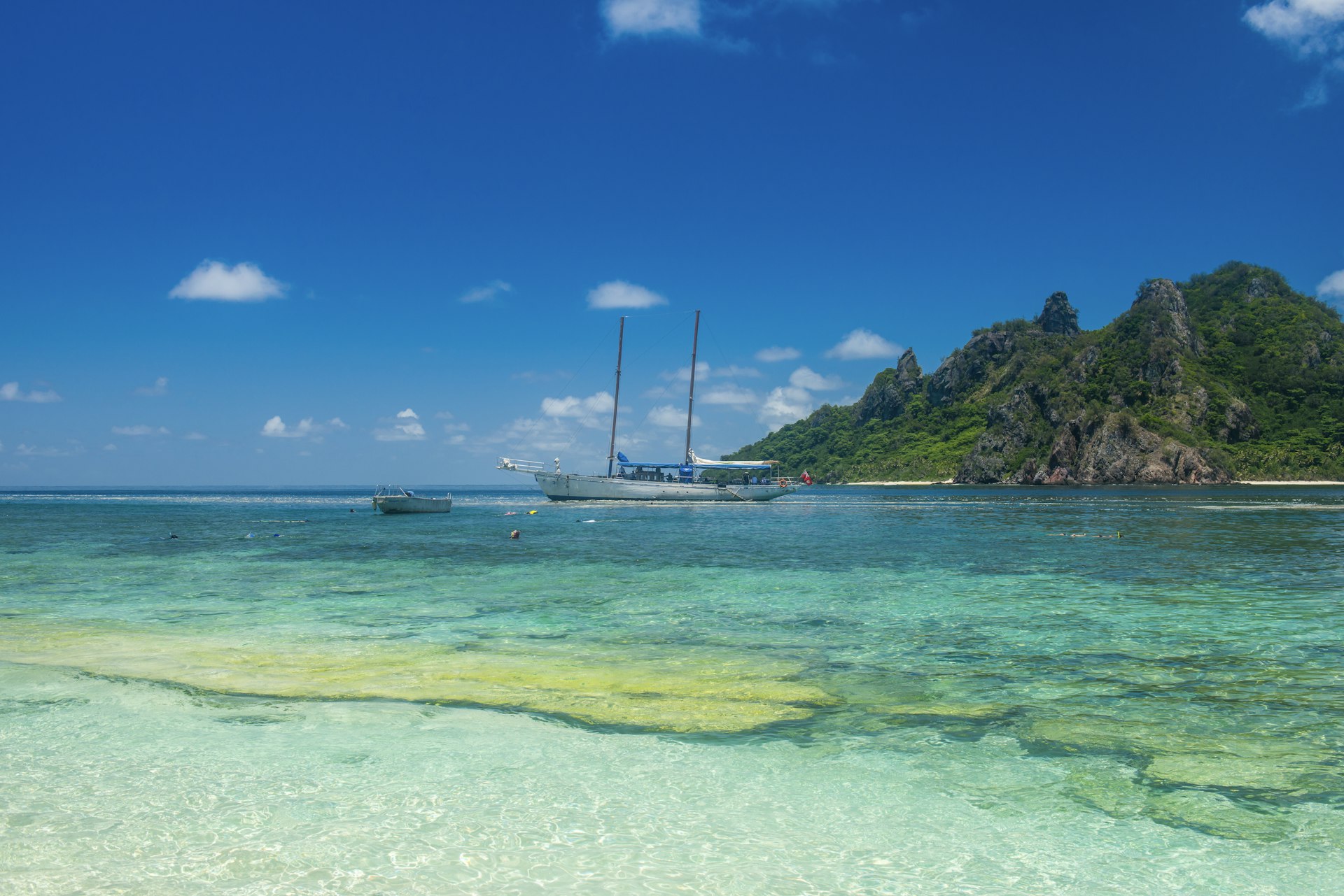 Fiji, Mamanuca islands, Monuriki, turquoise water and boat