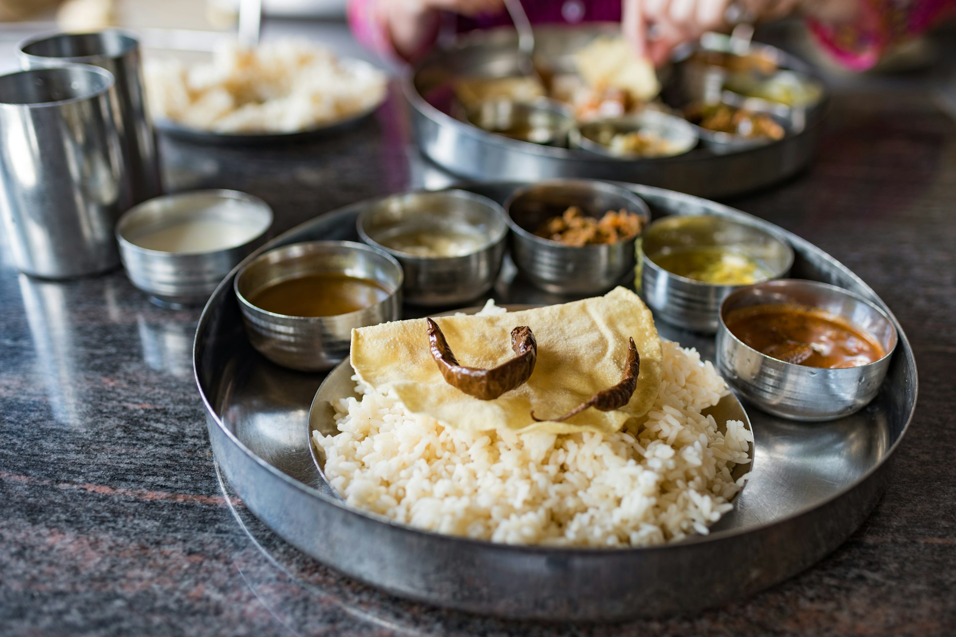 Rice and curry is the Sri Lankan national dish, seen here served on a thali plate. 
