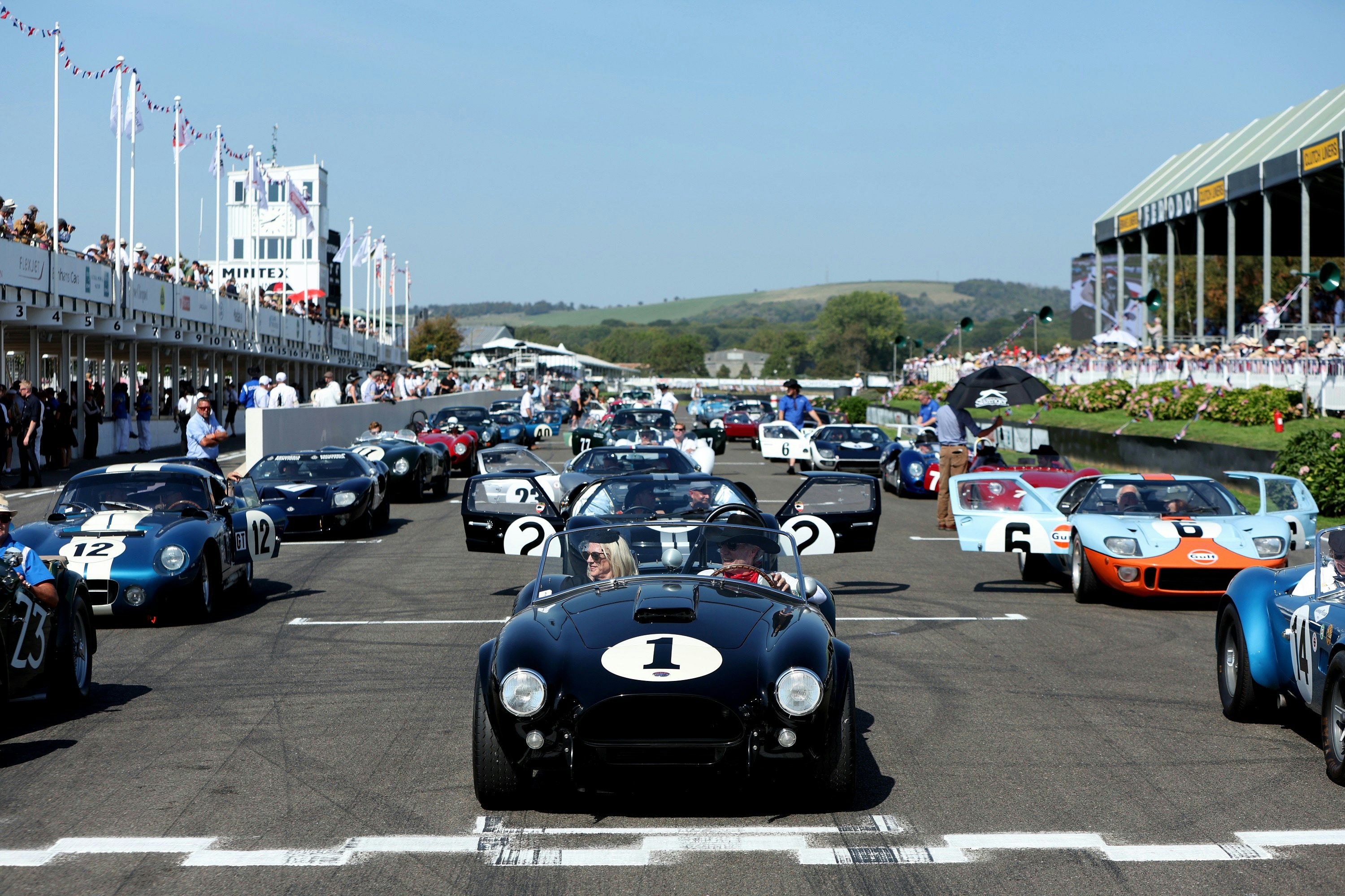 Drivers waiting to circle the track at the Goodwood Revival.