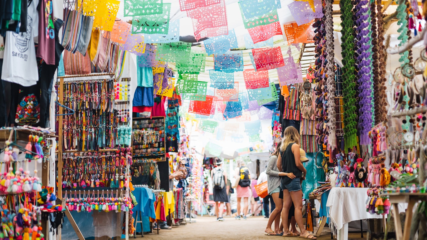 Mom And Kids Shopping In Mexico Street Market.