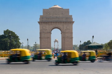 India Gate - With CNG Taxis Passing By
At the centre of New Delhi stands the 42 m high India Gate, an "Arc-de-Triomphe" like archway in the middle of a crossroad. Almost similar to its French counterpart, it commemorates the 70,000 Indian soldiers who lost their lives fighting for the British Army during the World War I. The memorial bears the names of more than 13,516 British and Indian soldiers killed in the Northwestern Frontier in the Afghan war of 1919.