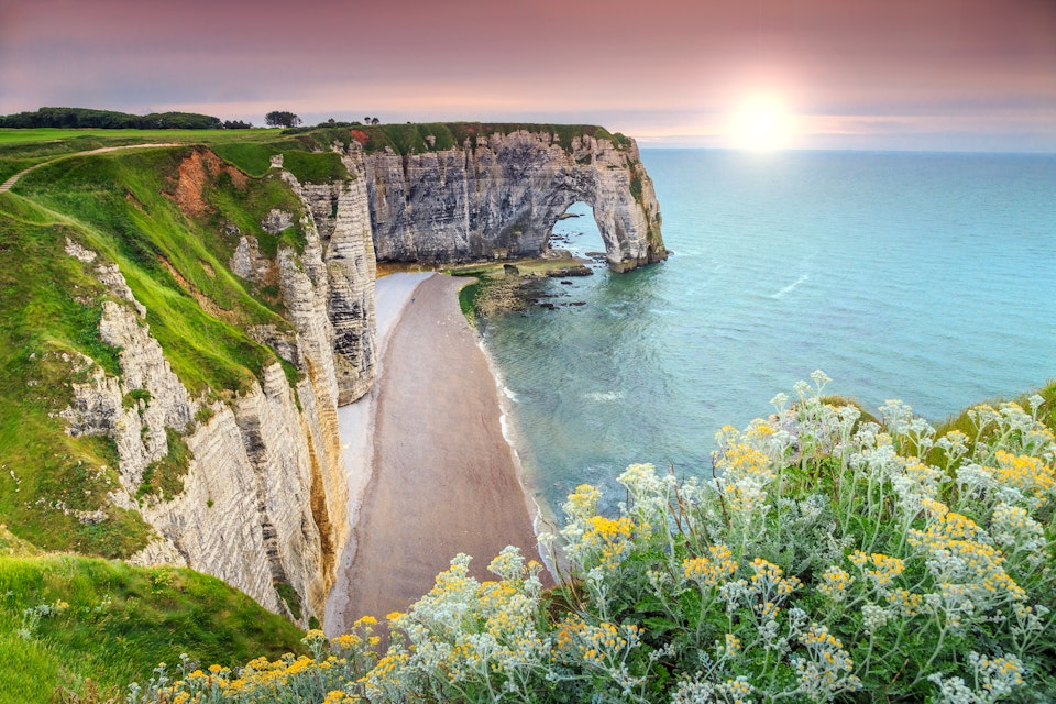 Amazing cliffs Aval of Etretat and beautiful famous coastline,Normandy,France,Europe
601934360
Normandy, Stone - Object, Chalk - Rock, Arranging, Seascape, Etretat, Coastline, Steep, Grass, Dusk, Scenics, Arch, Illuminated, Protection, Tall - High, Journey, Green Color, Famous Place, High Up, Travel Destinations, Nature, Aerial View, Brittany, France, Europe, Flower, Sunset, Sunrise - Dawn, Summer, Rock - Object, Cliff, Beach, Bay Of Water, Natural Arch, Hill, Landscape, Sky, Atlantic Ocean, Sea, Water's Edge, Wave, Water, Tourist Resort
