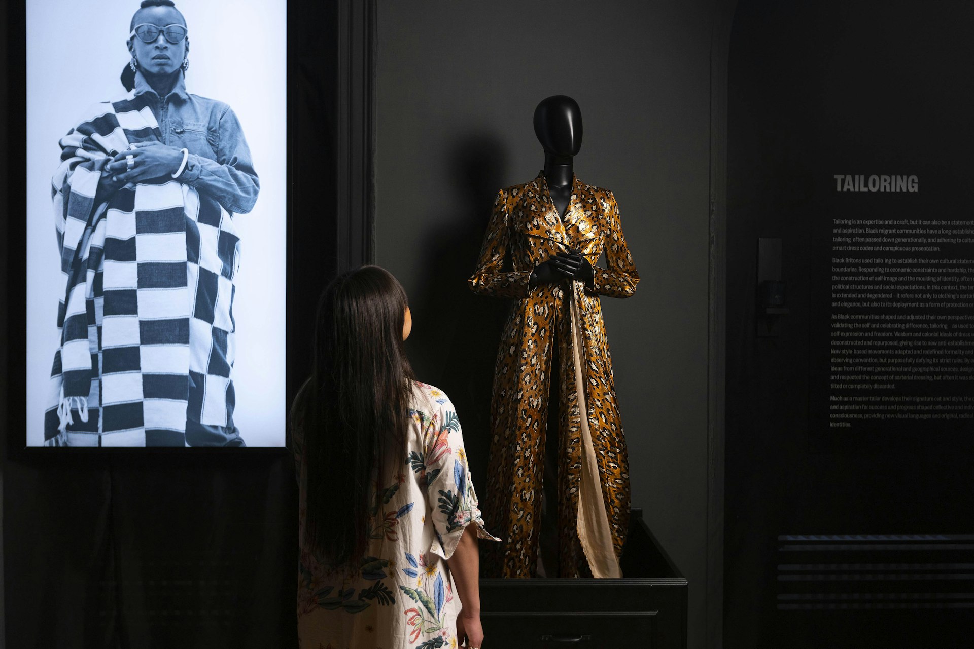 Erica Davletov views a piece by Ninivah Khomo ahead of the opening of ‘The Morgan Stanley Exhibition - The Missing Thread: Untold Stories of Black British Fashion’ at Somerset House, London